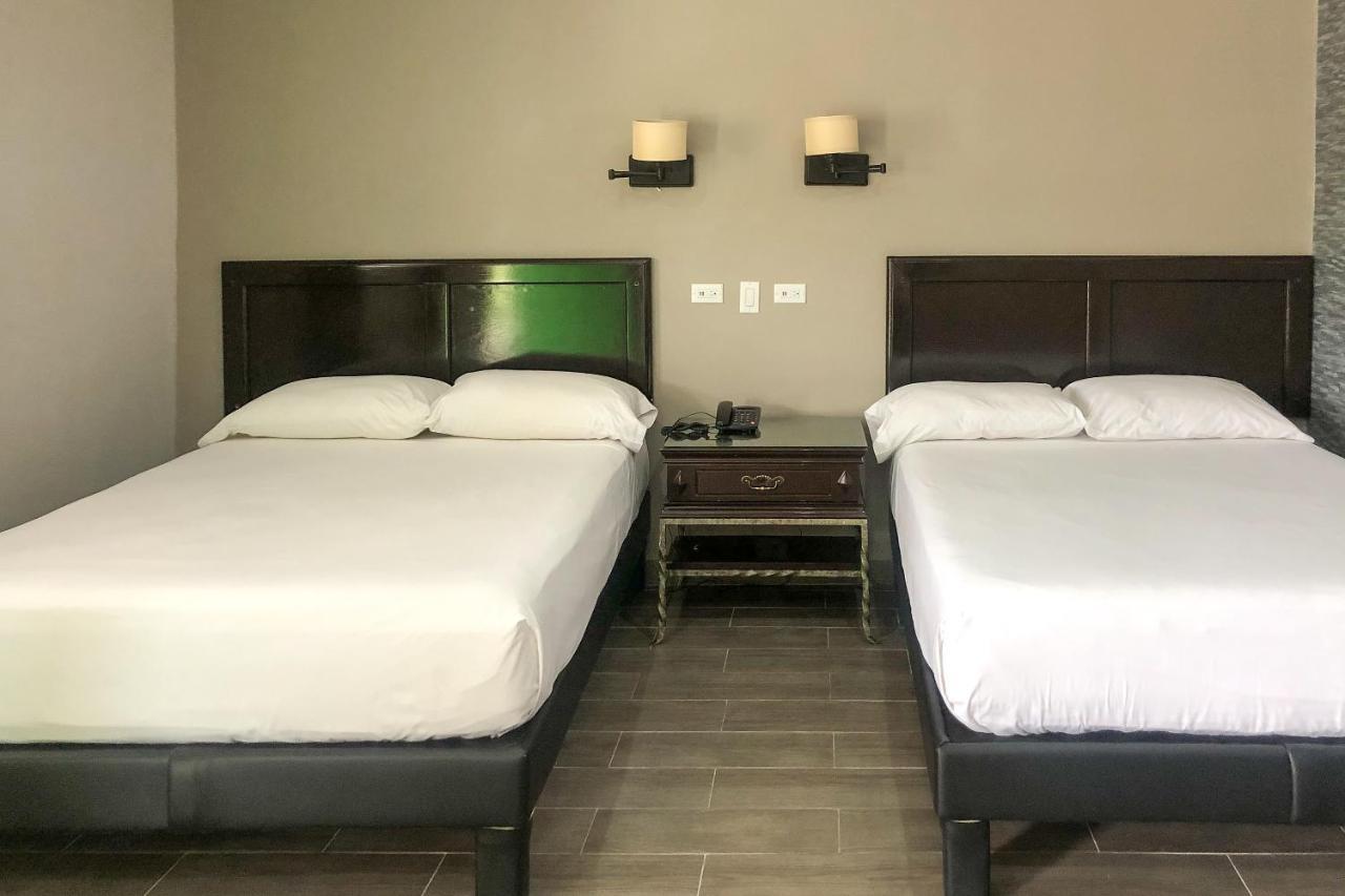 Capital O Palms Hotel, Acuna Ciudad Acuña Eksteriør bilde
